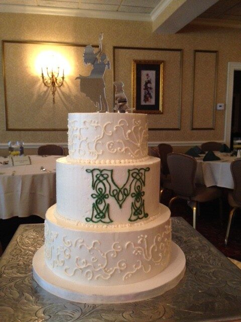 Scroll work wedding cake